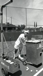 Andre Agassi's father with a tennis ball machine