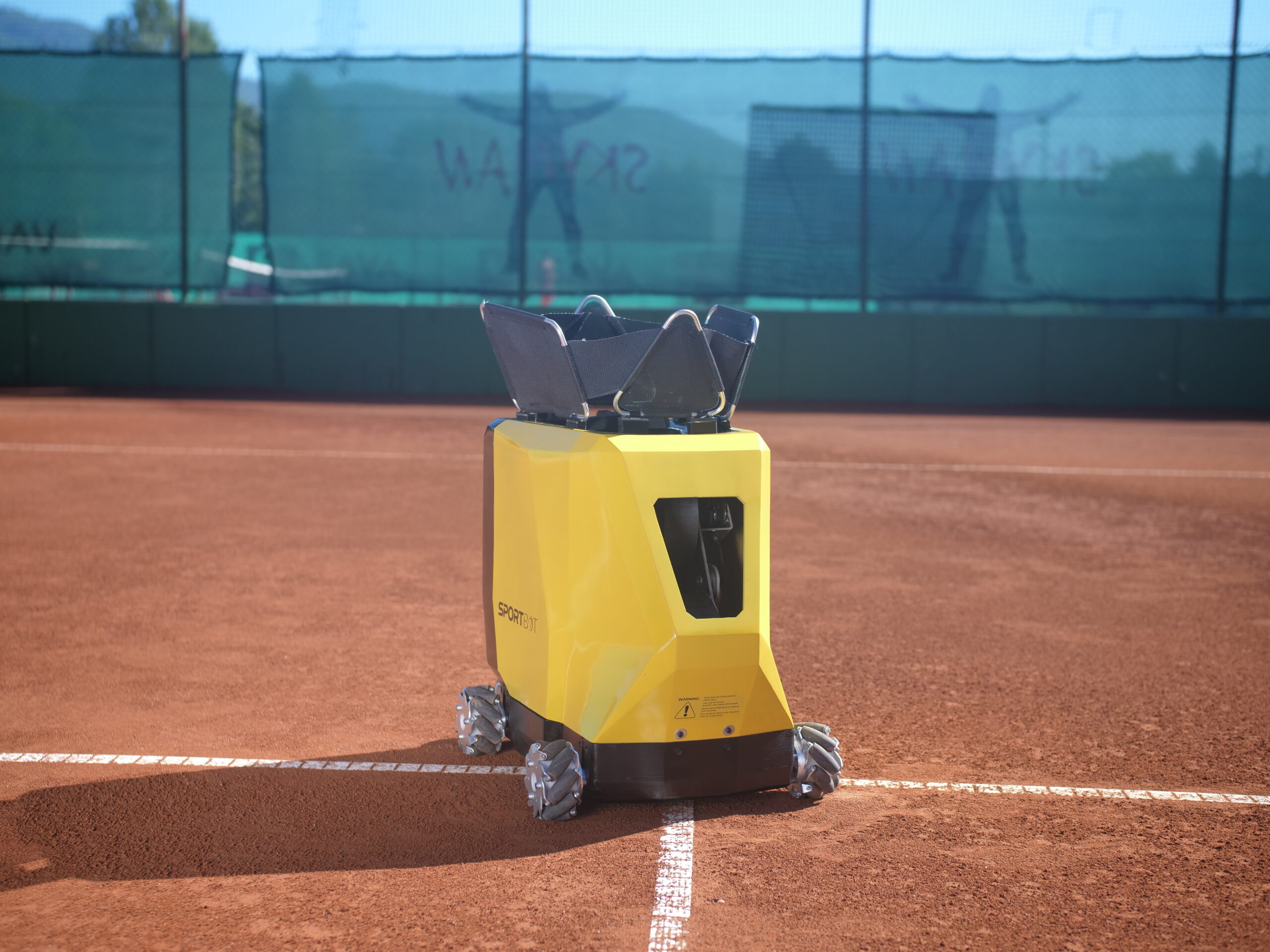 Moving tennis ball launcher