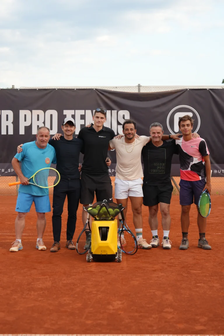 Fred Gil and the Sportbot team with the moving tennis ball machine on the clay court at UTR PTT Ljubljana