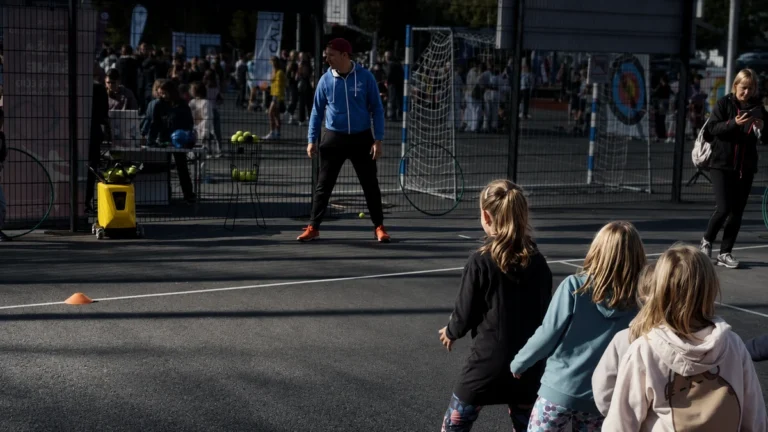 Children taking part in Sportbot’s tennis activity at Slovenian Sports Day in Kamnik
