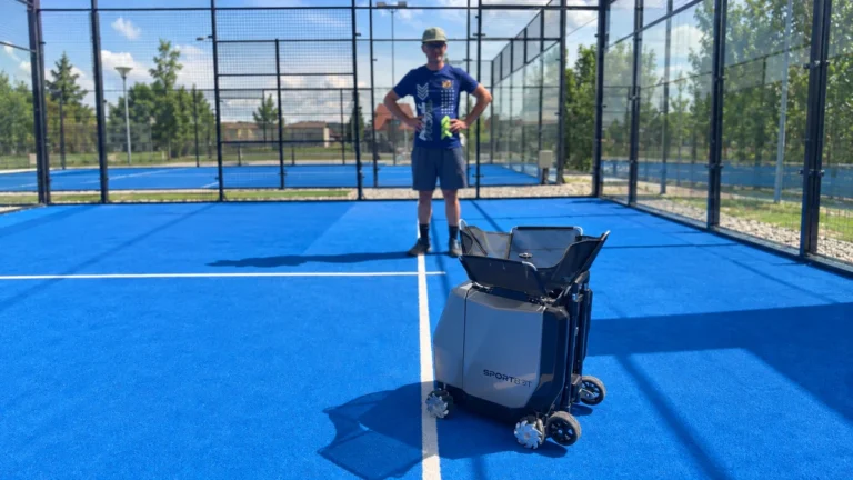A person behind Sportbot on the padel court at Transylvanian